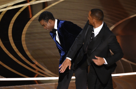 Will Smith slaps Chris Rock at the Oscars on March 27. COURTESY OF THE NEW YORK TIMES