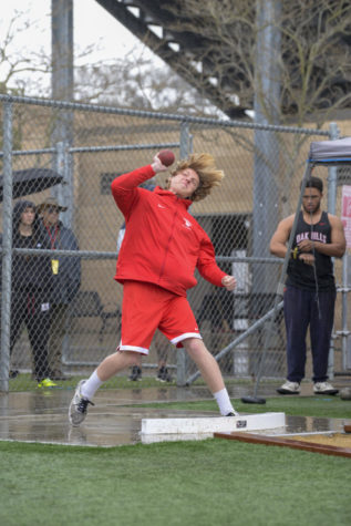 Freshman Jack Horn reaches the apex of his throw.
Photo by Caitlyn Cisneros. 