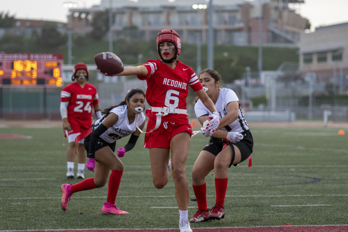 Raychel Watts runs in for a touchdown.
Photo by Cat Wong