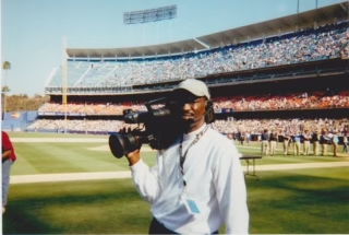 Mcintyre with his camera at Dodger Stadium. 
Courtesy of Michael Mcintyre