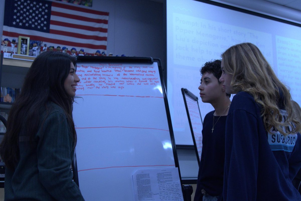 Students discuss an Ethnic Studies assignment.